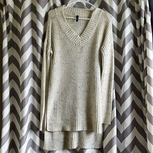 Cream v neck sweater with slits
